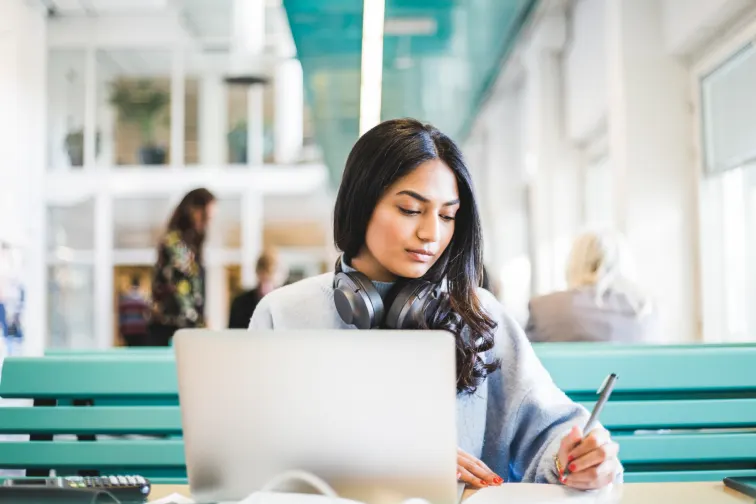 A student working at her computer