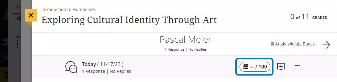 صورة لأعلى رد طالب على مناقشة، توضح أيقونة قاعدة التقدير داخل قرص التقدير
