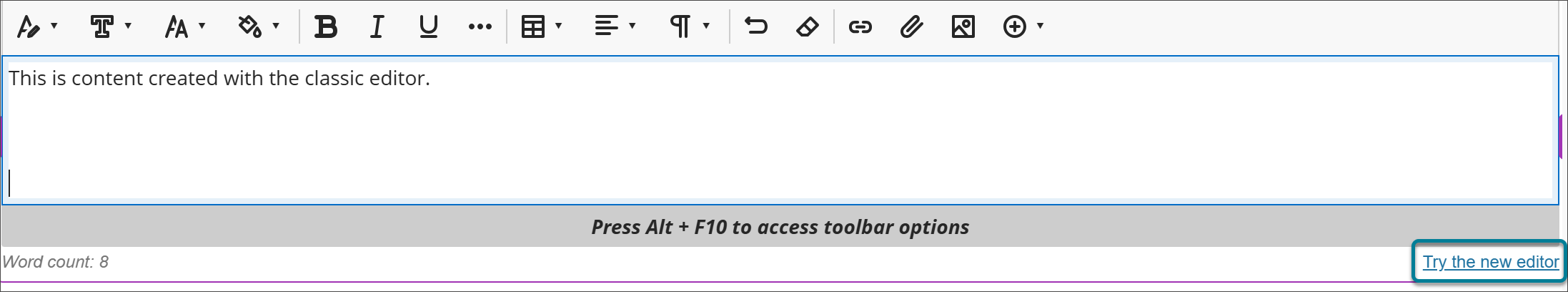 El editor de contenido clásico, con el texto «Este es un contenido creado con el editor de contenido clásico» introducido. Debajo del editor y a la derecha, el enlace «Prueba el nuevo editor» aparece resaltado con un recuadro.